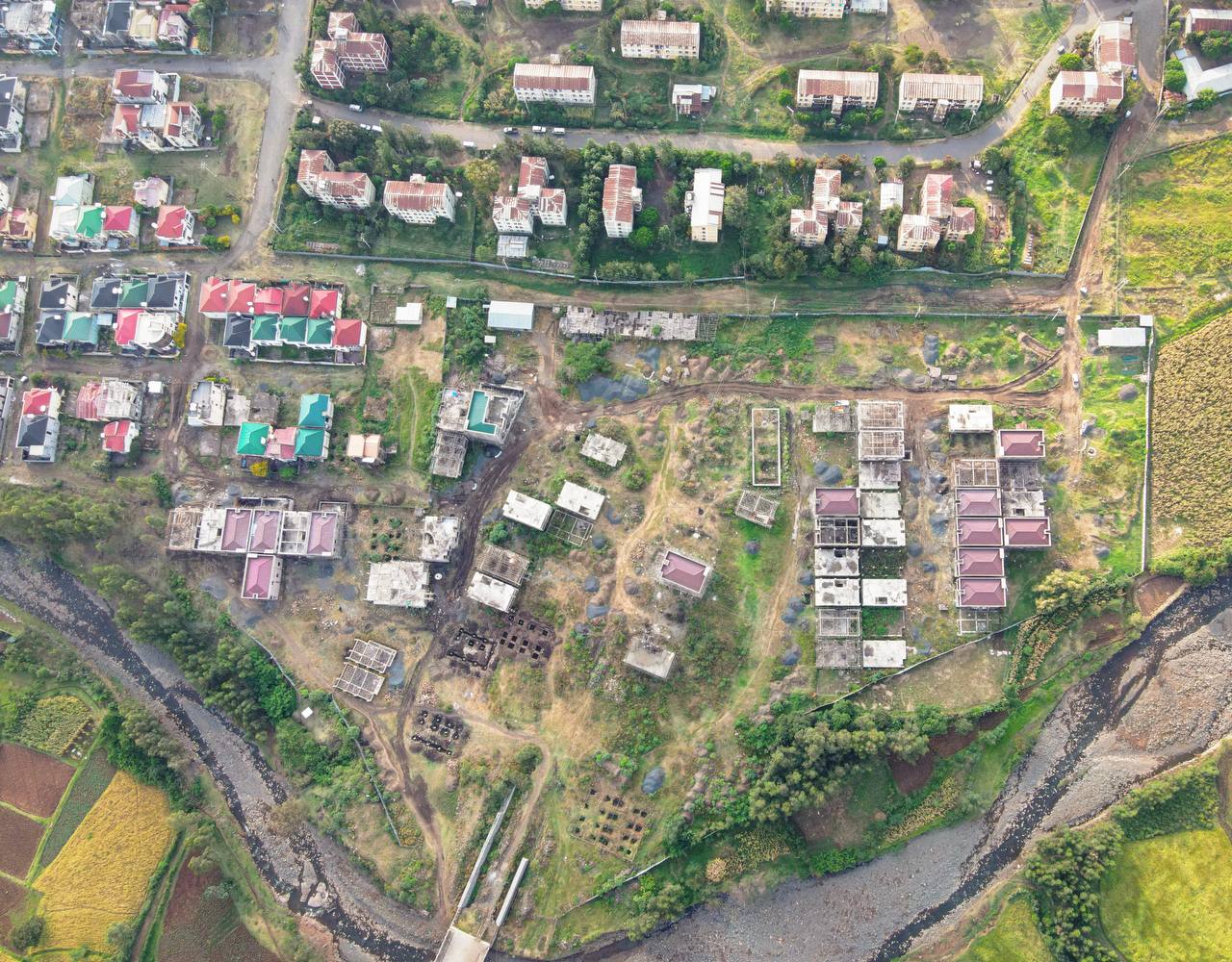 Overview of the Negestat Gondar housing project and surrounding green area